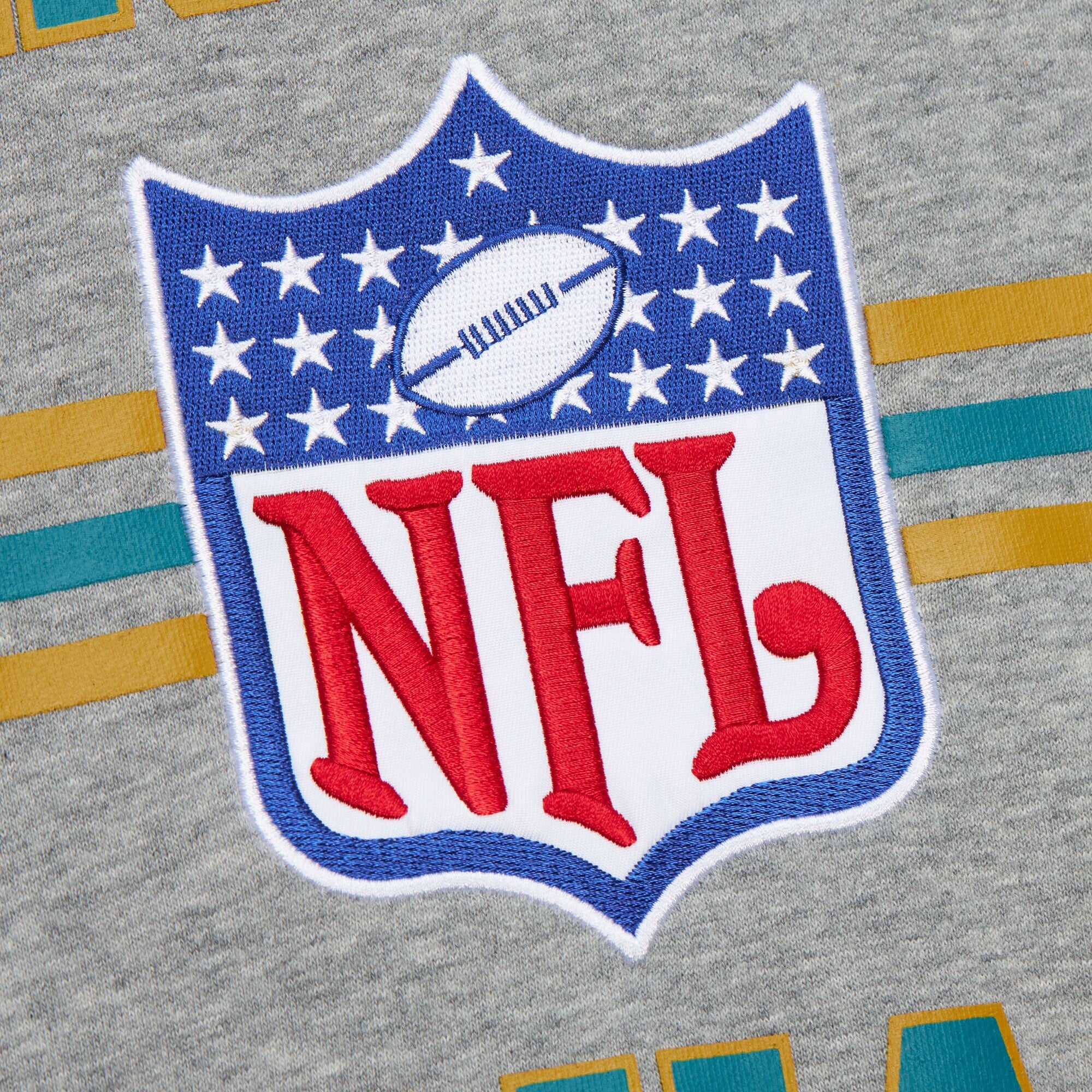 Jacksonville Jaguars Mitchell & Ness All Over Crew 4.0 Vintage Logo